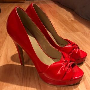 Red high heel pumps